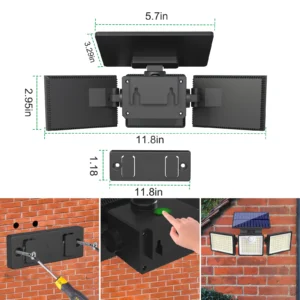Black solar wall light outdoor lamp glowing warmly on wooden fence