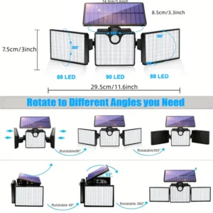 Black solar wall light outdoor lamp glowing warmly on wooden fence