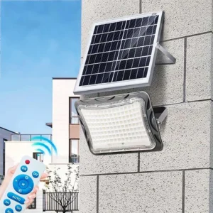 Grey plastic solar floodlight with wireless remote control, suitable for indoor and outdoor wall mounting to provide flexible adjustable lighting for residential spaces.