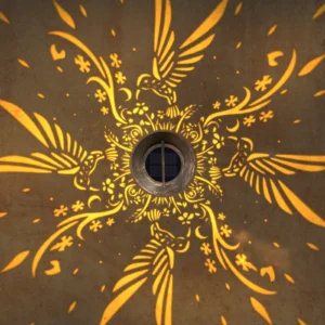 close‑up view of bird flower projection pattern from antique‑bronze solar hanging lantern.